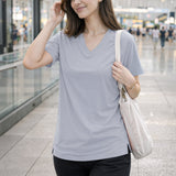 Light Grey Women’s Stretch Performance T-Shirt on a model – Lux Decor